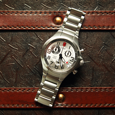 VICTORINOX® Base Camp Chronograph - Rugged, yet refined, this Swiss-made quartz movement watch is water resistant to 100M.  Features a stainless steel bracelet with double-locking safety clasp, screw-in caseback, luminescent hands and date calendar.  Includes diver extension.